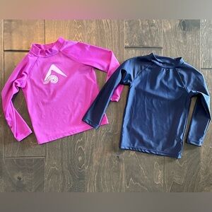 2 swim shirts 2T excellent condition